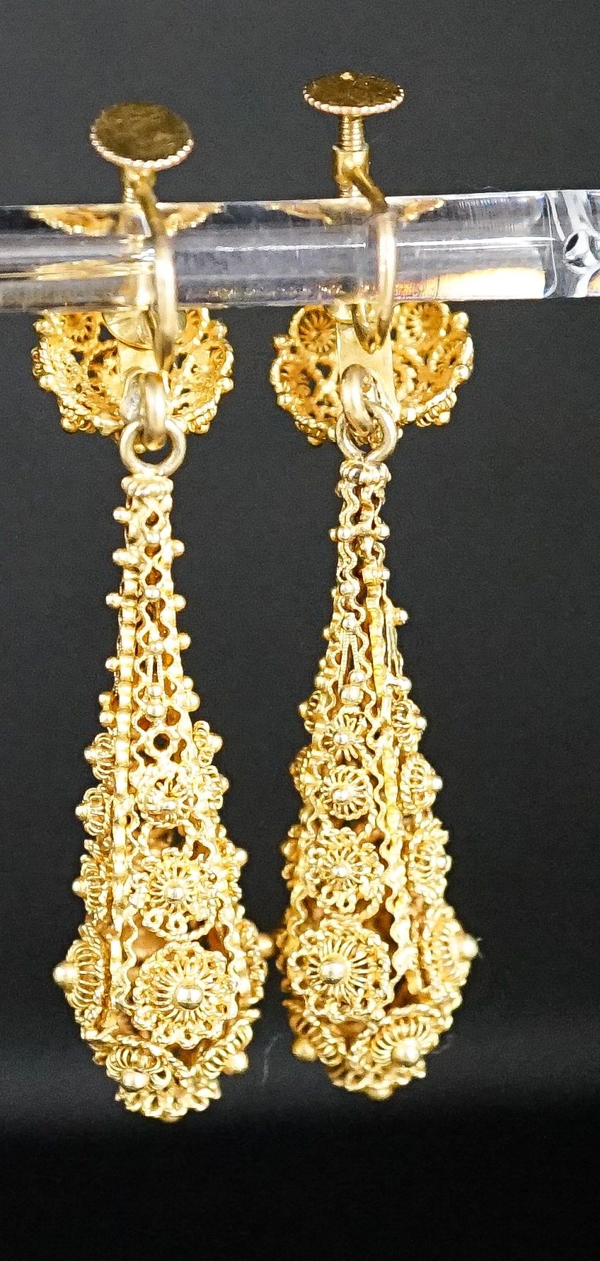 A pair of antique yellow metal filigree cannetile work teardrop shaped earrings, 45mm. 4.6cm.